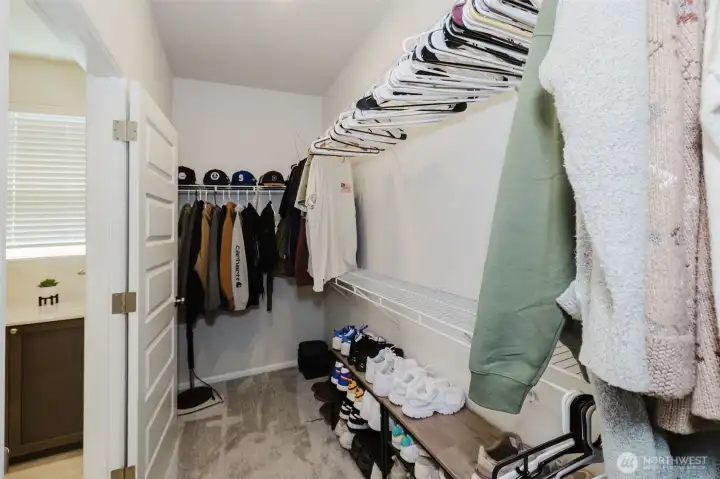 Spacious Primary Closet Spacious Primary Closet