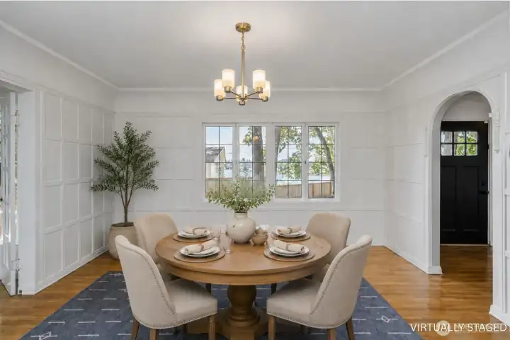 Arched door ways with trim pieces for sought after character. Don't miss the sunroom perfect for plants to your left. Arched door ways with trim pieces for sought after character. Don't miss the sunroom perfect for plants to your left.
