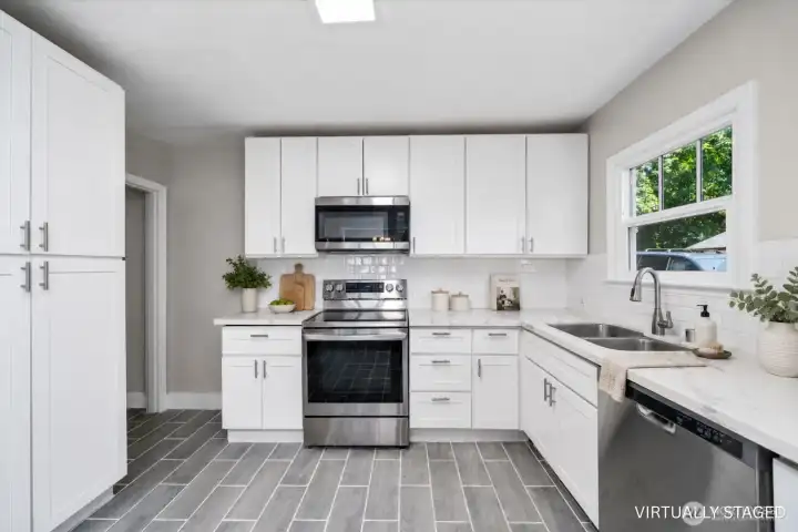Lots of kitchen storage and updated SS appliances Lots of kitchen storage and updated SS appliances