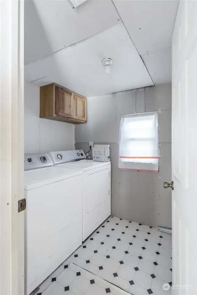 Laundry room with washer and dryer included. Located Downstairs.