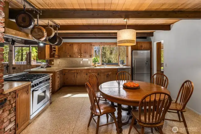 The original beamed ceilings add a unique, timeless touch, highlighting the character and craftsmanship of the home while enhancing its warm, inviting atmosphere.