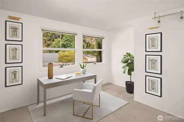 This room is the perfect office space, complete with an adjoining sitting room, ideal for relaxation or informal meetings.