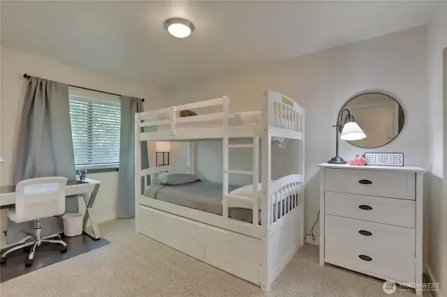 6607 second bedroom with desk, bunk beds with trundle and dresser