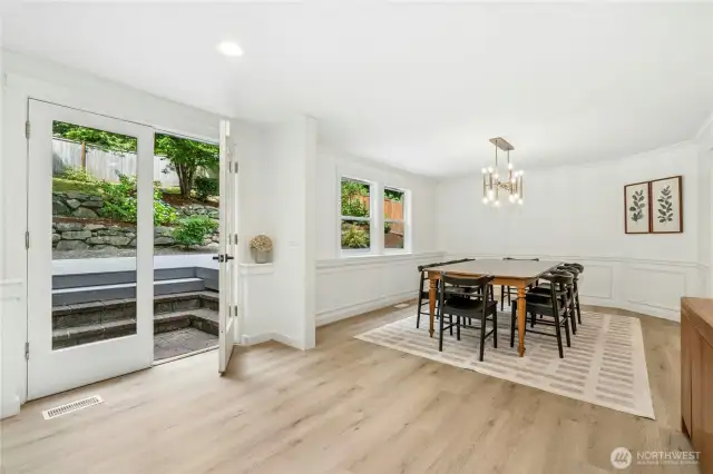Dining room and kitchen open to backyard