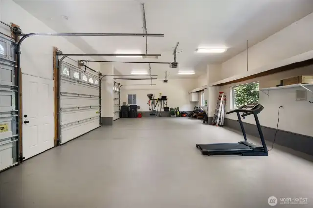 3 car garage that is extra deep and extra tall. Plenty of room for storage and PNW toys galore.