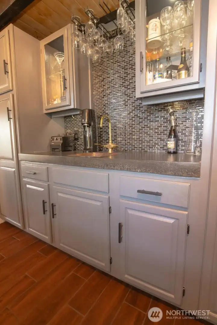 Stunning wet bar with sink and wine fridge
