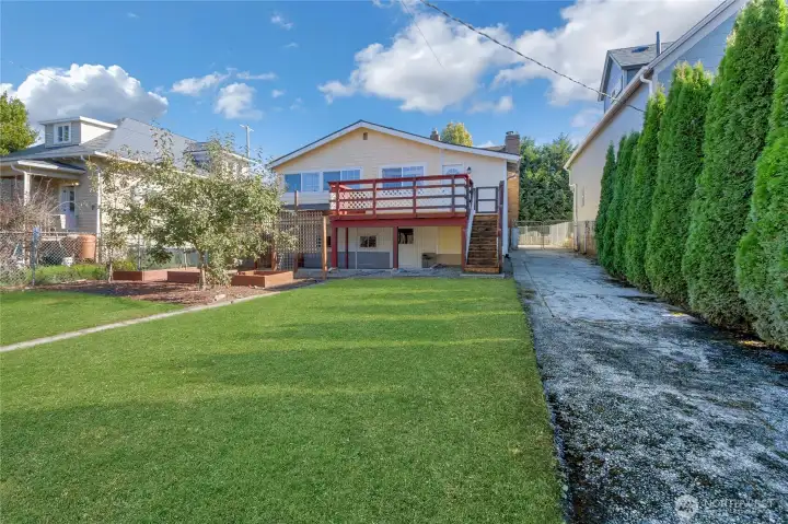 Back Yard Facing Home and driveway.