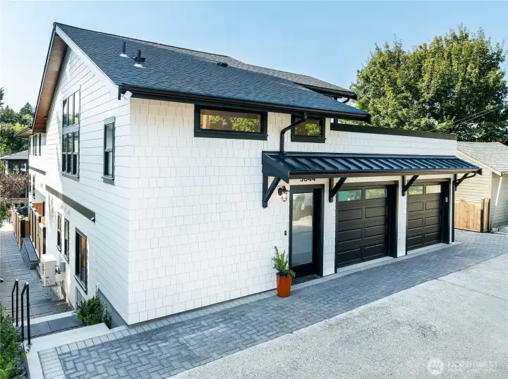 There are 2 garage spaces plus a parking pad so 3 total spots.