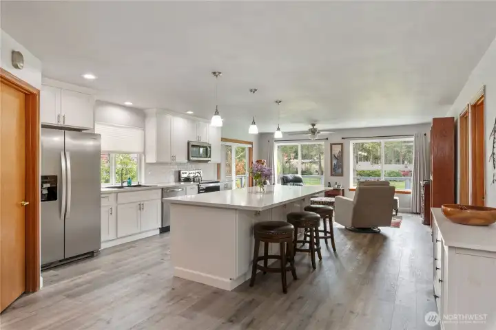 Bright and light and open dream kitchen with huge island!