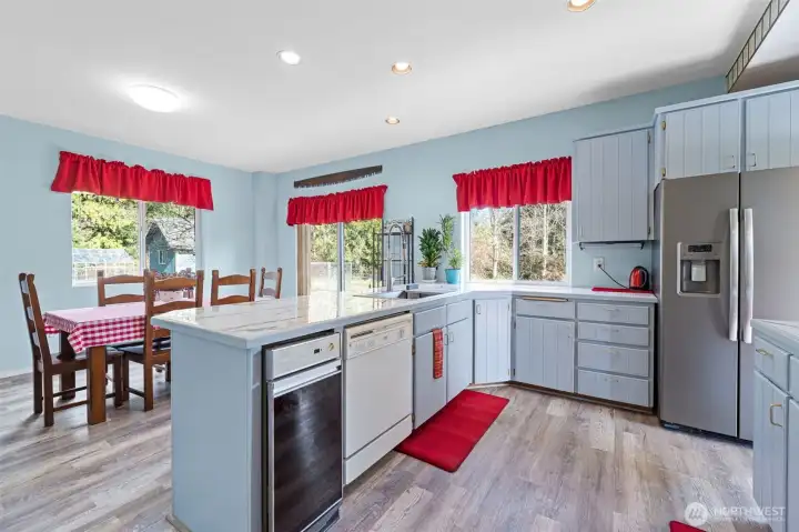 Another view of this wonderful kitchen~gleaming coated porcelain counters