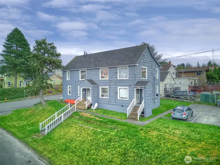 Grassy lawn in front and back