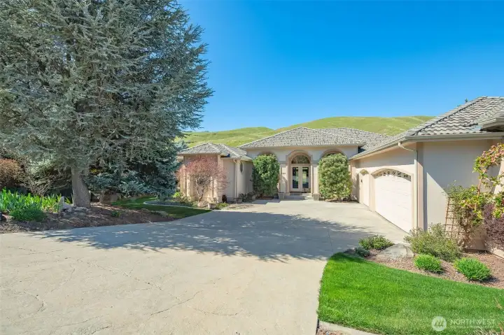 Highly sought-after Broadview Subdivision rambler with 2,880 sq ft on a .45-acre lot, offering exceptional curb appeal, mature landscaping, and a concrete tile roof.