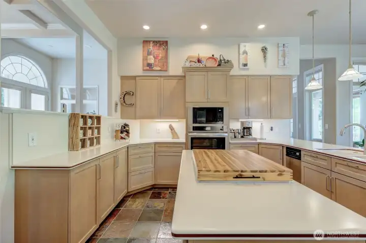 Kitchen featuring new oven, under-cabinet lighting, and ample prep space designed for functionality and style.