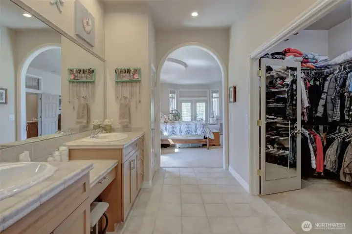 Large walk-in closet offering generous storage and organization options.