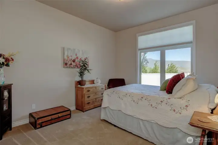 Bedroom with scenic Sunnyslope and canyon views, adding to the home’s peaceful setting.