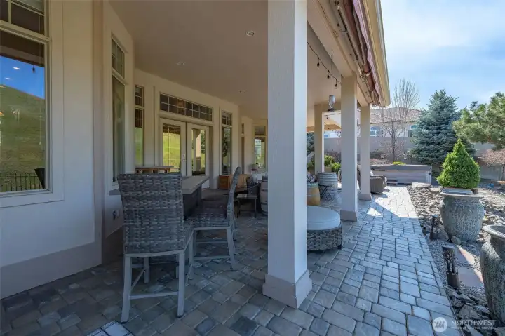 Stamped concrete and paver patios with party lighting create the ultimate entertaining environment.