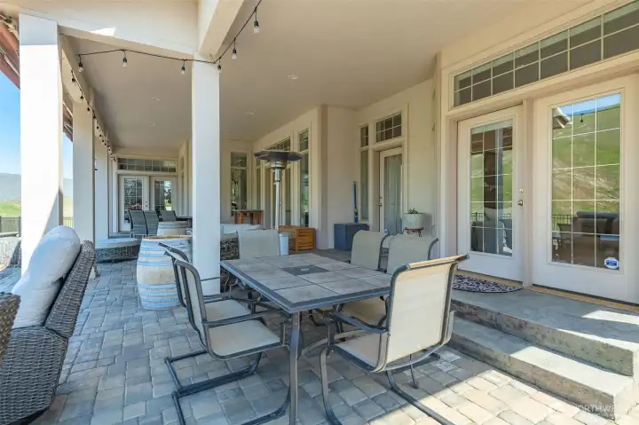 Stamped concrete and paver patios with party lighting create the ultimate entertaining environment.