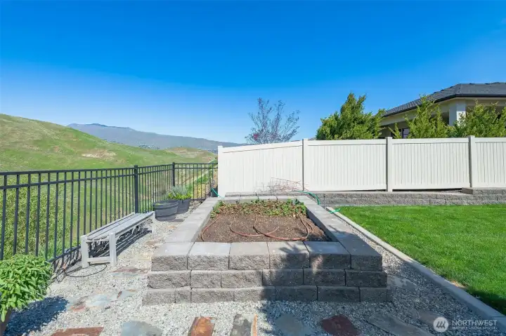 Side gate access with additional outdoor zones and flexible use space.