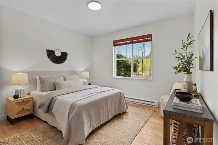 one of two lower spacious bedrooms