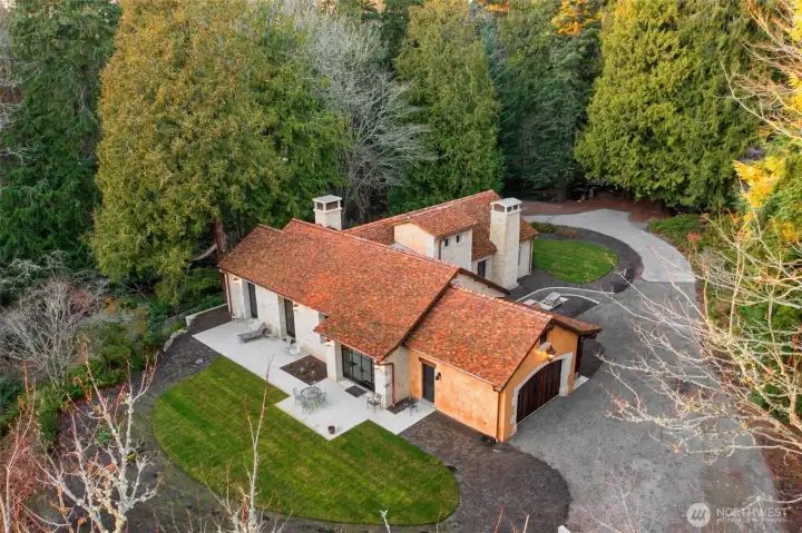 Set on three private acres, the property offers space, serenity, and a rare sense of seclusion.