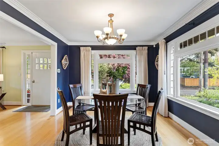 The dining room sits between the kitchen and the living room. (That's not an accident — that's the plan.)