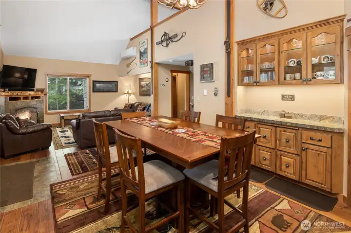 Another view of the dining room and kitchen area.