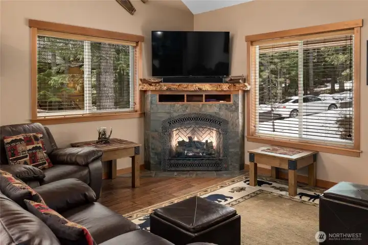 Large windows to allow for natural light, cozy fire place for those cold days to keep you warm.