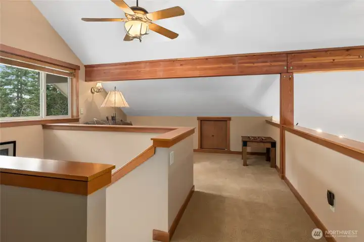 Upstairs leads you to upper floor loft. It is a wrap around loft. This is one side of the loft.