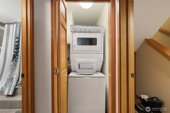 On the lower level you will also find a laundry room. Nice easy stackable unit.