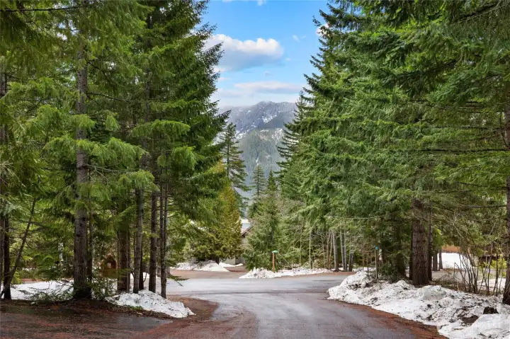 From the front of the home as you enter into the driveway you can see the stunning view Easton Ridge mountains.