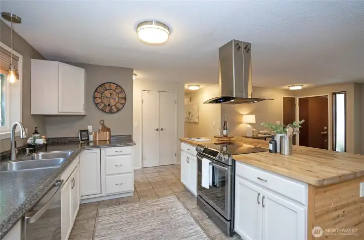 Kitchen with large butcher block island Kitchen with large butcher block island