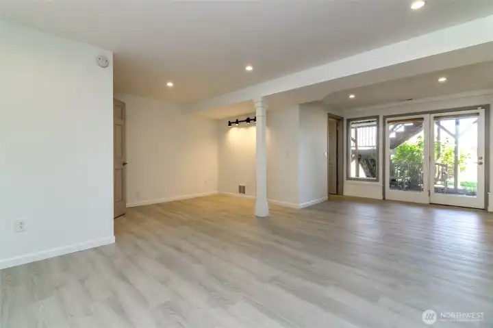 Lower level w/French doors to patio and backyard