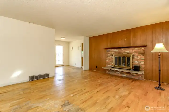 Main level living room, fireplace, dining