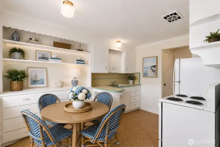 Virtually staged to show room for dining.
