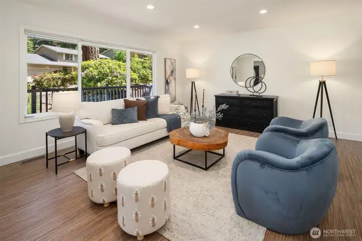 Gather with friends in the windowed living area.