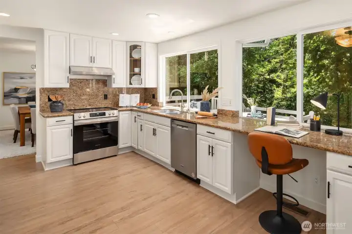 Scenic windows span the updated kitchen.