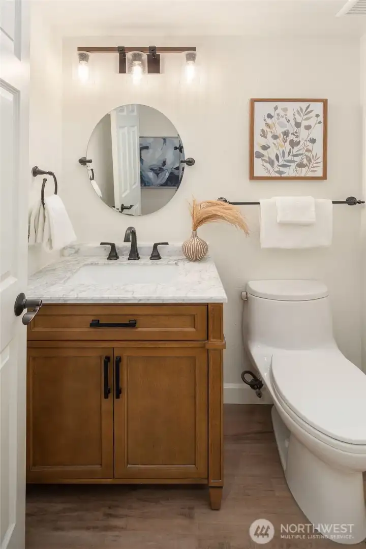 Updated powder room on the main floor.
