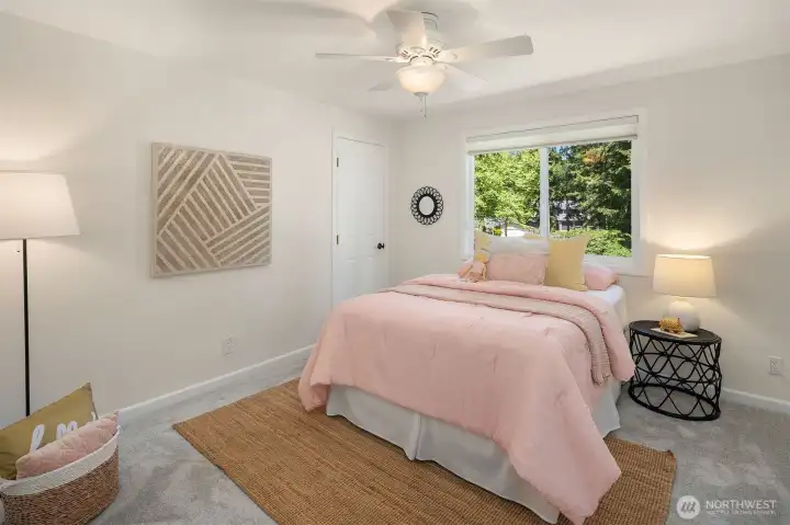 Fourth upstairs bedroom. Each bedroom includes a ceiling fan for summertime comfort.