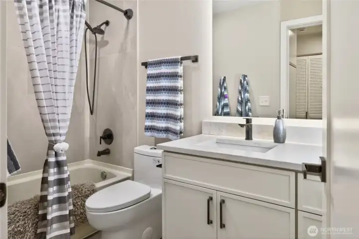 Brand New Large-Format tile shower, New Vanity & Honed Quartz for easy care, Undermount Sink.