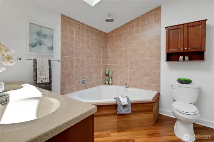 Large soaker tub in the primary suite. Large soaker tub in the primary suite.