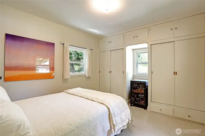 Primary bedroom with tons of built-ins.