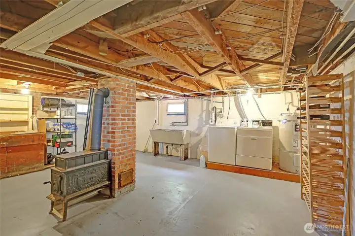 Unfinished basement offers tons of storage & laundry.