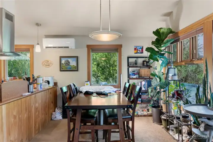 Dining area adjacent to kitchen Dining area adjacent to kitchen