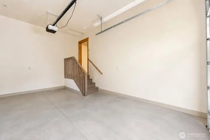 Generously sized single car garage. Photo cleared of all furniture and belongings using Chat GPT Generously sized single car garage. Photo cleared of all furniture and belongings using Chat GPT