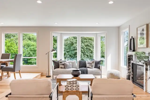 Large windows bring in views of Lake Washington and all the surrounding greenery