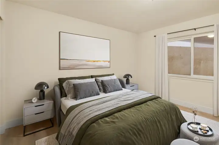 4th bedroom located in daylight basement. Virtually staged 4th bedroom located in daylight basement. Virtually staged