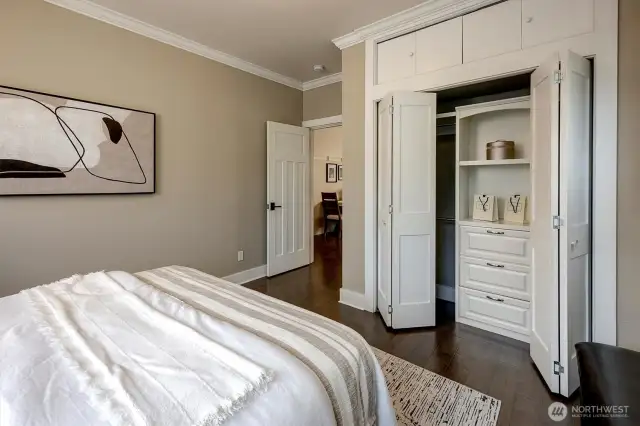 Expanded closet with built-ins and extra overhead storage