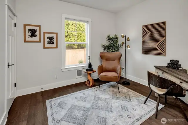 2nd BR with view of the common garden. West facing. Back door leads to shared yard.