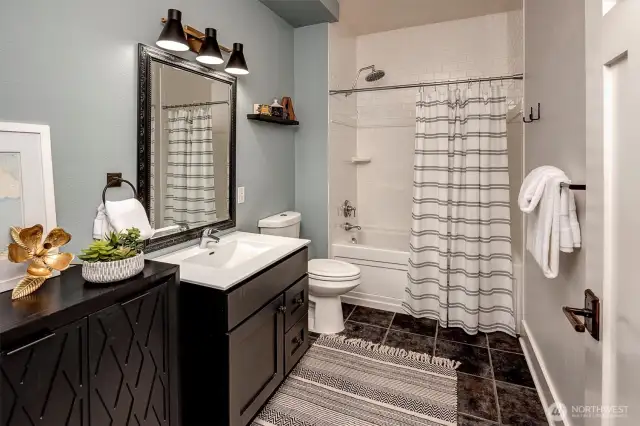 Huge spa-like Bath with jetted tub, subway tile and black slate tile