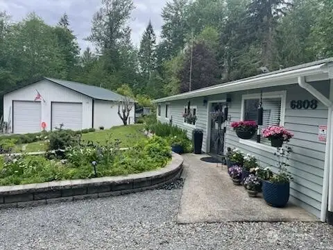 2,356 SF one-level living on serene 1.25 acre.  A must-see for all the upgrades and features!